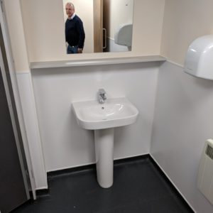 half height Whiterock splashback behind a sink.