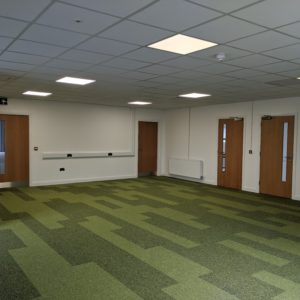 green contrasting colour strip effect carpet tiles installed in Hereford