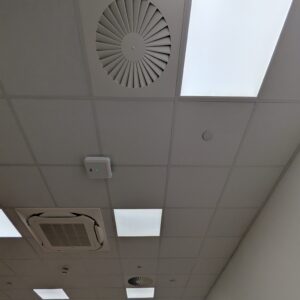 Suspended grid ceiling with lights and ventilation system
